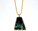 Raw Emerald Free form 14K gold pendant set with diamond