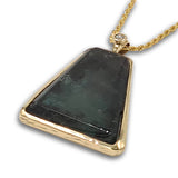 Raw Emerald Free form 14K gold pendant set with diamond