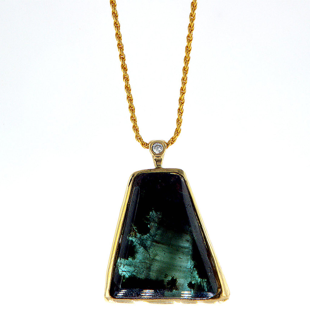 Raw Emerald Free form 14K gold pendant set with diamond
