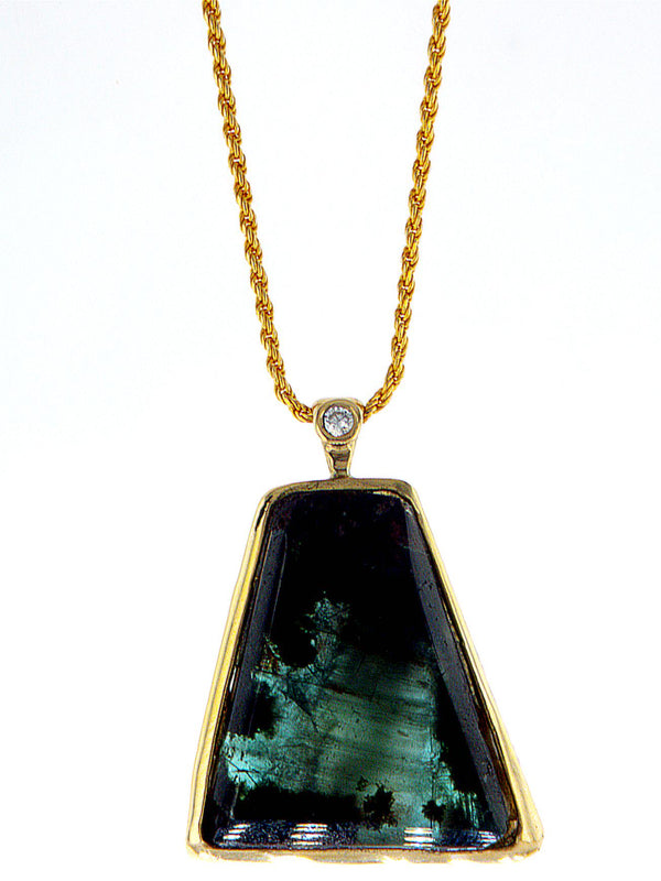 Raw Emerald Free form 14K gold pendant set with diamond