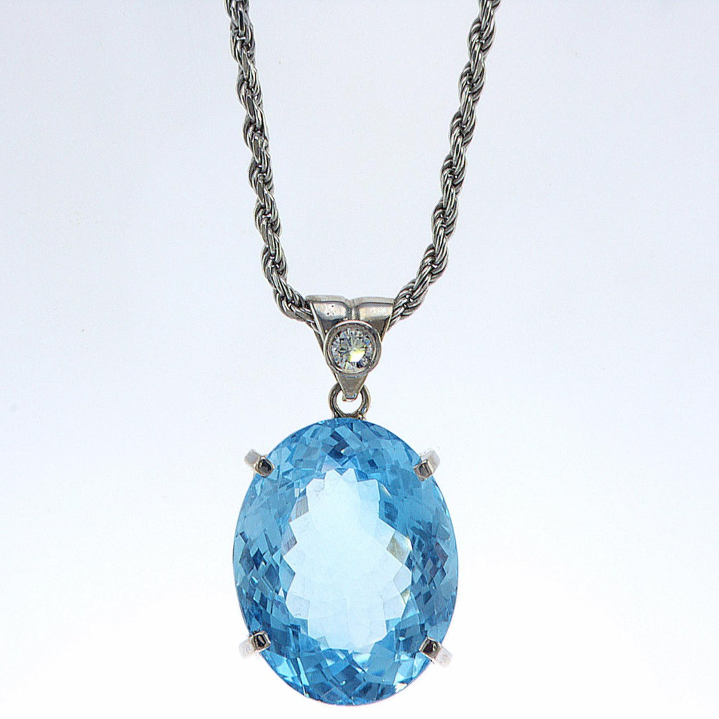 Blue Topaz white gold pendant with diamond