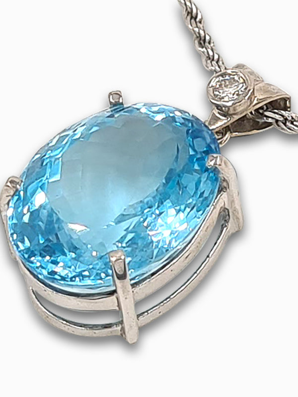 Blue Topaz white gold pendant with diamond